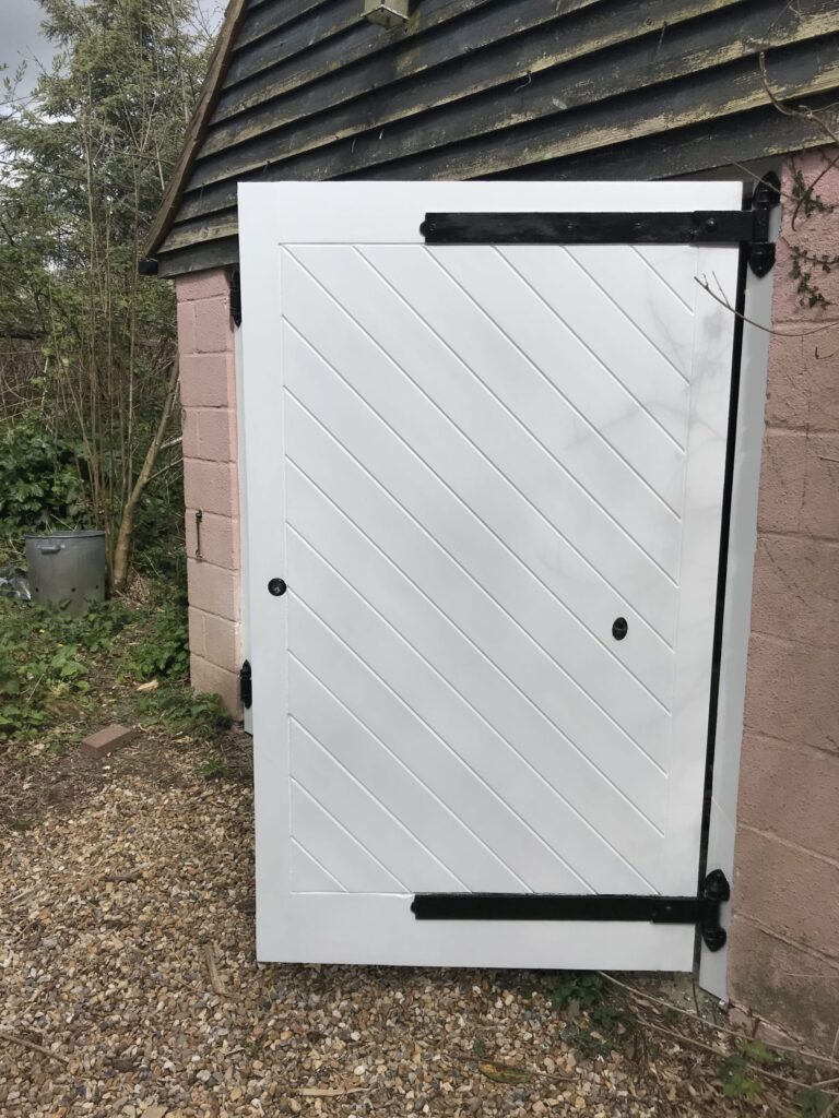 Double garage doors painted and finished